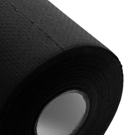 Disposable laminated paper sheet in black, 50 x 40 meters, by BVShop, shown rolled out with laminated surface visible.