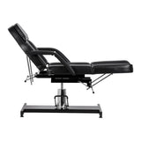 Black salon client chair with adjustable split footrest by Sillon