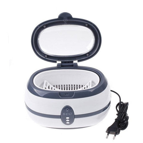 Professional ultrasonic cleaner VGT-800 by Beauty System with 600ml capacity, featuring stainless steel tank and control panel.