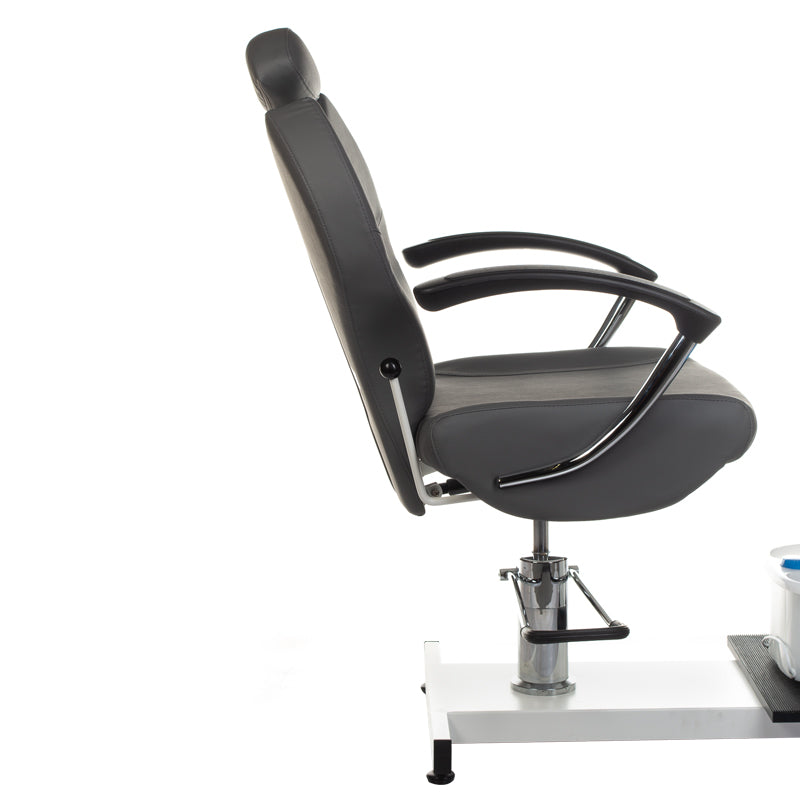 Gray pedicure chair with built-in foot massager by Beauty System, featuring plush upholstery and modern design for salon comfort.