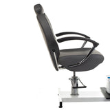 Gray pedicure chair with built-in foot massager by Beauty System, featuring plush upholstery and modern design for salon comfort.