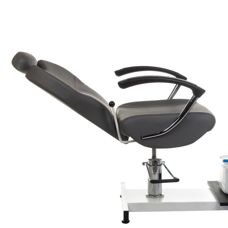 Gray pedicure chair with built-in foot massager from Beauty System, featuring comfortable seating and modern design.