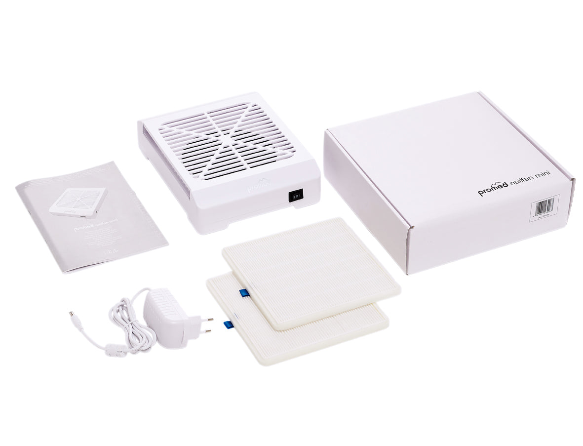 Mini Dust Suction Promed White by Beauty System, close-up of the compact white dust suction device on a clean surface.