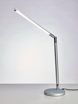 Beauty System PROMED LTL-749 LED table lamp with non-shadow lighting, modern design, and adjustable arm for targeted illumination.