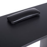 Black manicure table from Beauty System model BD-3425 with a sleek surface and storage drawers for professional nail salon use.