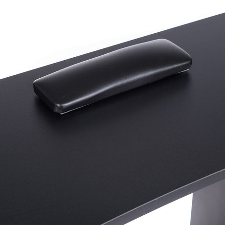 Black manicure table from Beauty System model BD-3425 with a sleek surface and storage drawers for professional nail salon use.