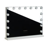 LED-lit Hollywood mirror by Beauty System, 58x43cm with illuminated border, reflecting a sleek, modern design.