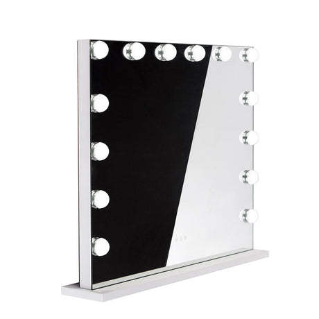 LED illuminated Hollywood mirror by Beauty System, 80x65cm with bright lighting, reflecting a modern bathroom vanity.
