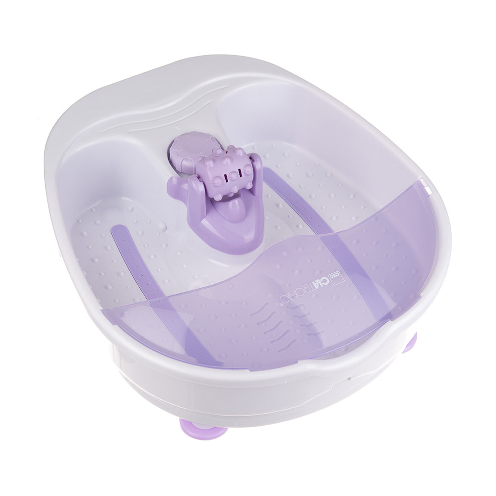 Beauty System foot massager designed for pedicure procedures, showing a close-up of the device with textured massage rollers.