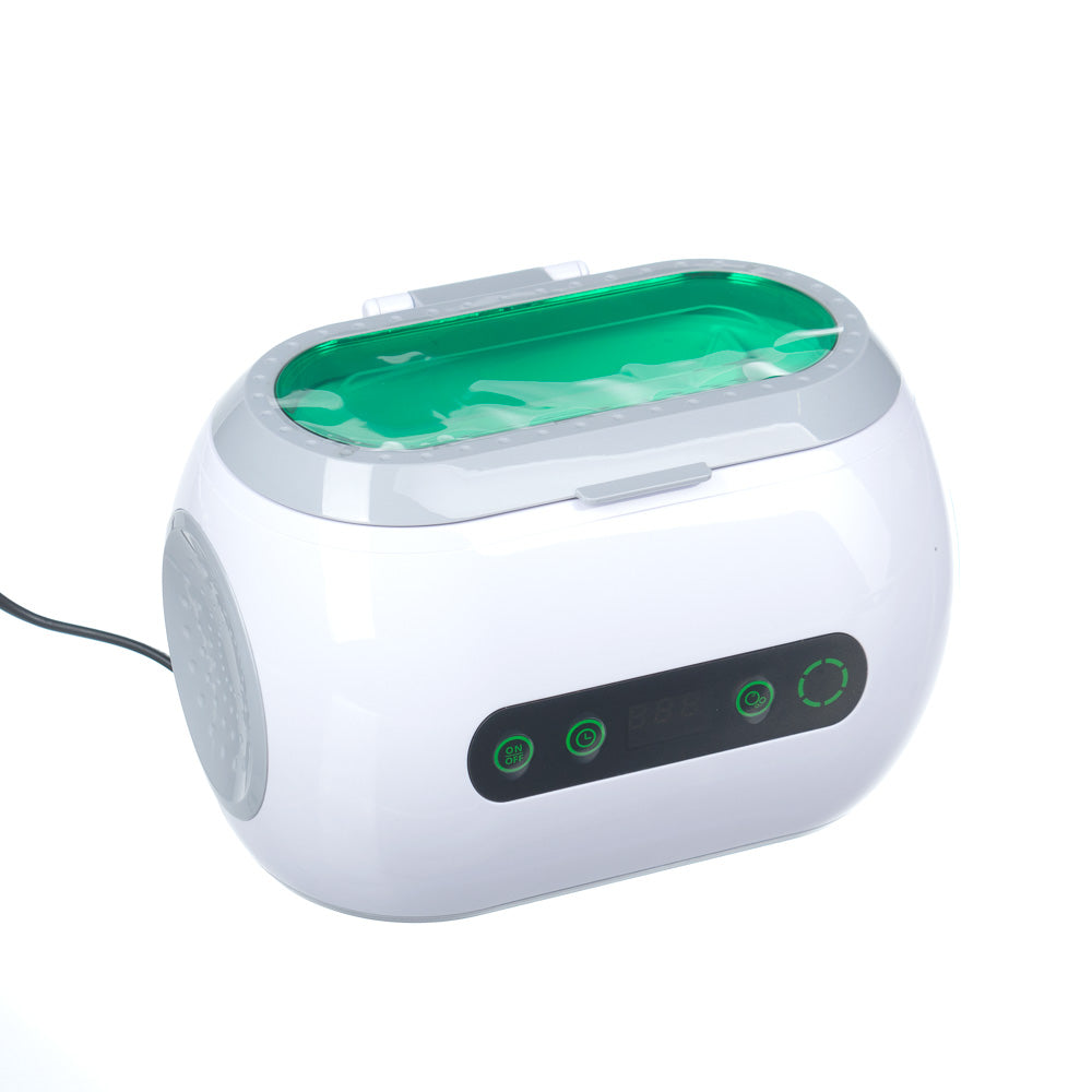 Professional ultrasonic cleaner VGT-9600 by Beauty System with stainless steel basin and control panel for deep cleaning jewelry and tools.