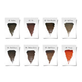 Dark brown pigment bottle labeled The Pigment 05 Dark Brown, 15ml, with a dark chocolate-colored cap and clear glass container.