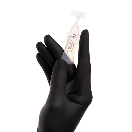 PhiAcademy Ultimate Skin Cocktail 3ml 5pcs — individual Ultimate Skin Cocktail ampoule held in a gloved hand