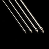 Sterile disposable piercing needles from BVShop, showing multiple thin, sharp needles used for body piercings.