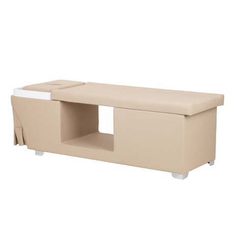 Gabbiano Head Spa Maldives hair washing bed in beige showing cushioned surface and ergonomic design for hair care comfort.