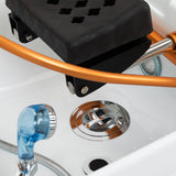 Gabbiano Head Spa Maldives hair washing bed in beige with cushioned surface and headrest for relaxing hair treatments.