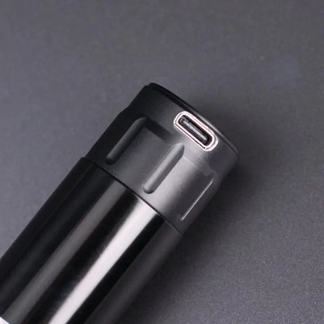 Wireless battery for Mast Tour e-bike, compact and portable power source with sleek design and charging ports.