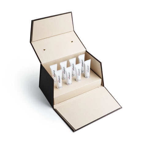 The Pigment Microblading Pigments Collection with 8 bottles of 10ml each, featuring a variety of shades for semi-permanent eyebrow tattooing.