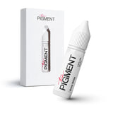 The Pigment Snow White Corrector Pigment 15ml bottle with white liquid inside, used for color correction and makeup applications.