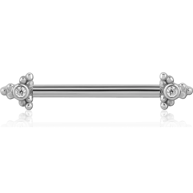 Kwadron nipple piercing earring with arrow design, silver-toned jewelry for body piercing, close-up of the earring on pierced skin.
