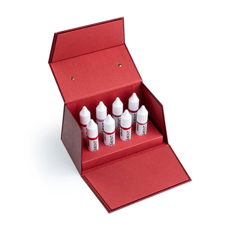 The Pigment PMU Lip Pigment Collection with 8 bottles of lip pigment in 15ml bottles, designed for permanent makeup tattooing.