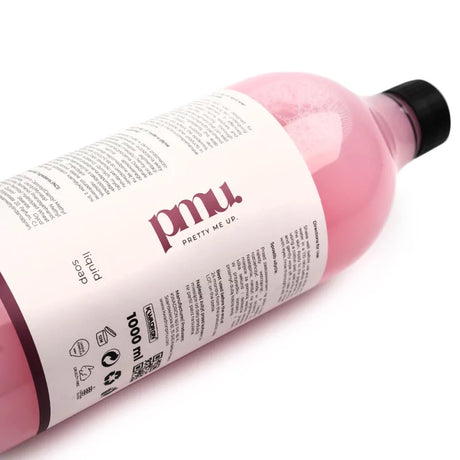 Kwadron Pretty Me Up Universal Liquid Cleanser 1000ml bottle, used for cleaning permanent makeup tools and equipment.