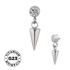 Titanium ring with spike bezel design, showcasing a sleek, modern jewelry piece with textured spikes on a smooth band.