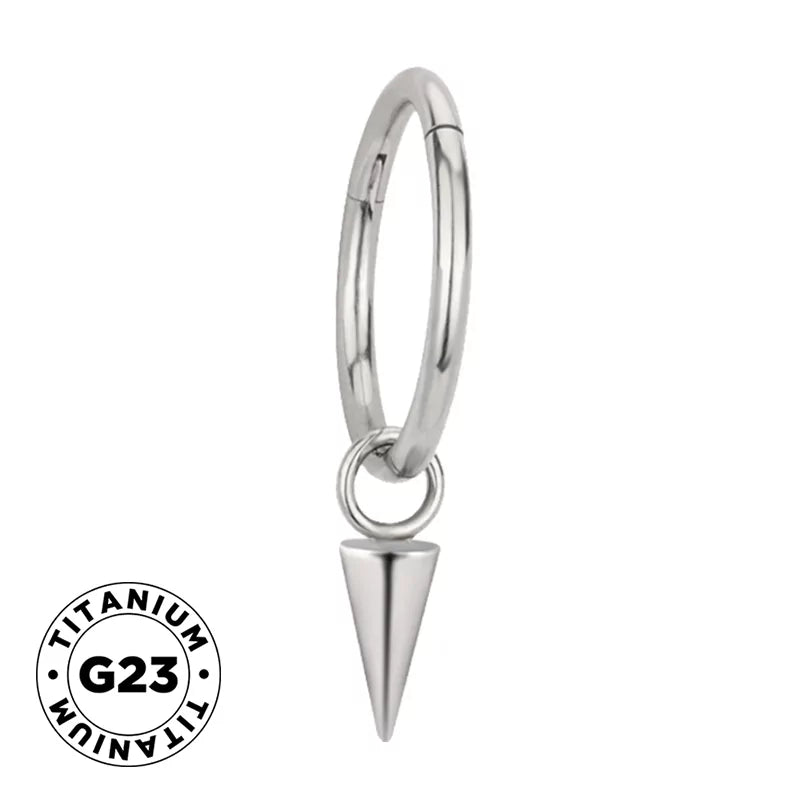 Titanium ring with spike dangle earring by BVShop, featuring a sleek, modern design with spikes hanging from a smooth titanium band.