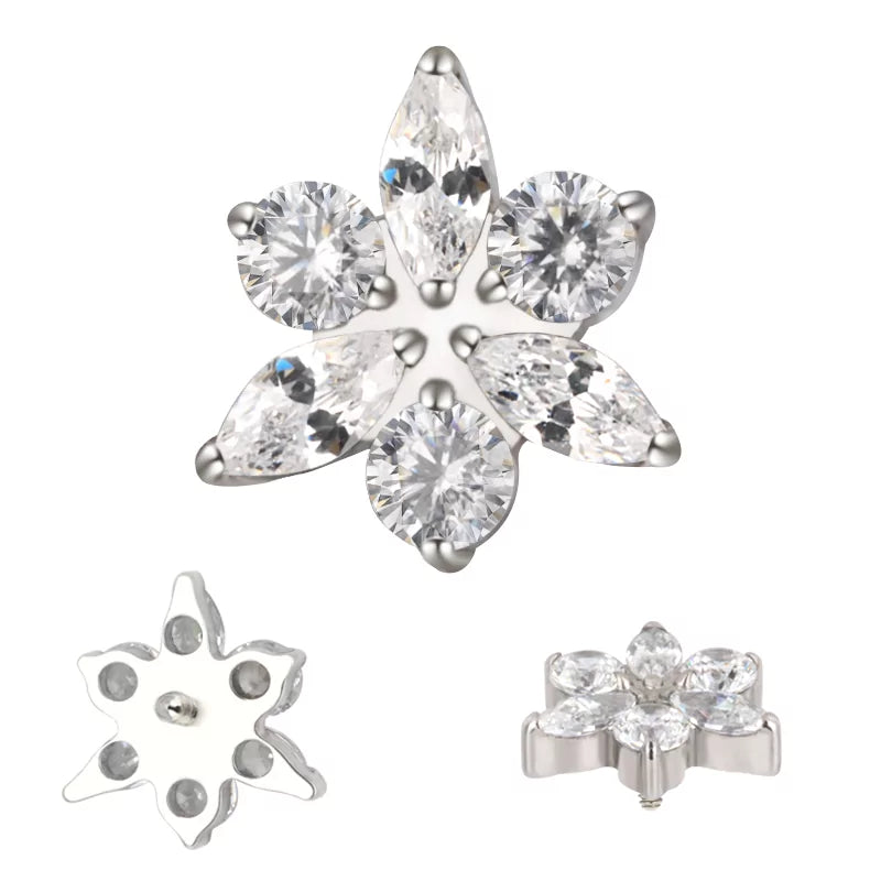 Titanium ring with star and flower engravings, stylish jewelry by BVShop, showcasing detailed craftsmanship and sleek design.