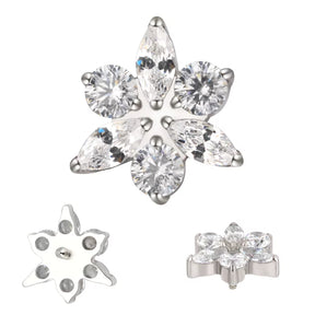 Titanium ring with star and flower engravings, stylish jewelry by BVShop, showcasing detailed craftsmanship and sleek design.