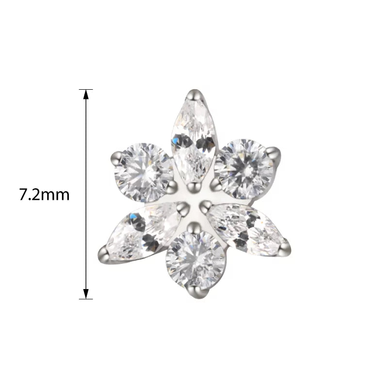 Titanium ring with star and flower engraved design, crafted by BVShop, showcasing detailed metalwork on a sleek band.