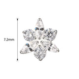 Titanium ring with star and flower engraved design, crafted by BVShop, showcasing detailed metalwork on a sleek band.