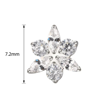 Titanium ring with star and flower engraved design, crafted by BVShop, showcasing detailed metalwork on a sleek band.