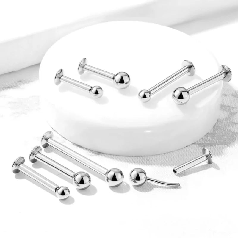 Titanium threadless ball top with labret-style piercing jewelry, featuring a smooth, polished finish for body piercing or ear cartilage.
