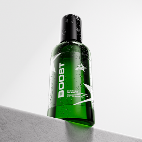 Unistar Boost Tattoo Care Oil 30ml bottle with dropper cap, designed for nourishing and soothing fresh tattoos.