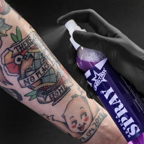 Unistar Nebula Tattoo Spray 240ml bottle with label, designed for tattoo aftercare and skin hydration.